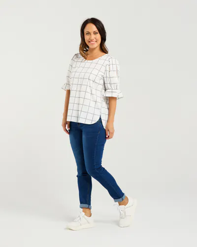 Model wearing White Grid Sadie Top By Seduce Available at Beetees Nelson